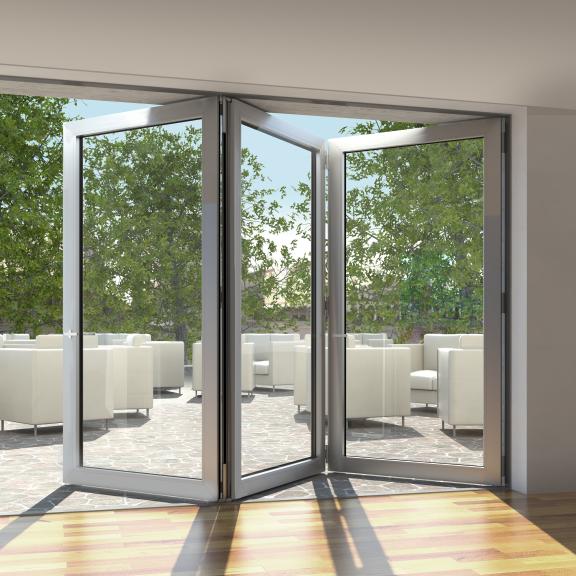Salon avec menuiserie aluminium à châssis accordéon INNEAL